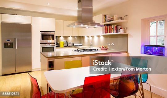 istock Modern kitchen and dining table 568519521