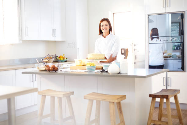 Portrait confident chef in kitchen  chefs whites stock pictures, royalty-free photos & images