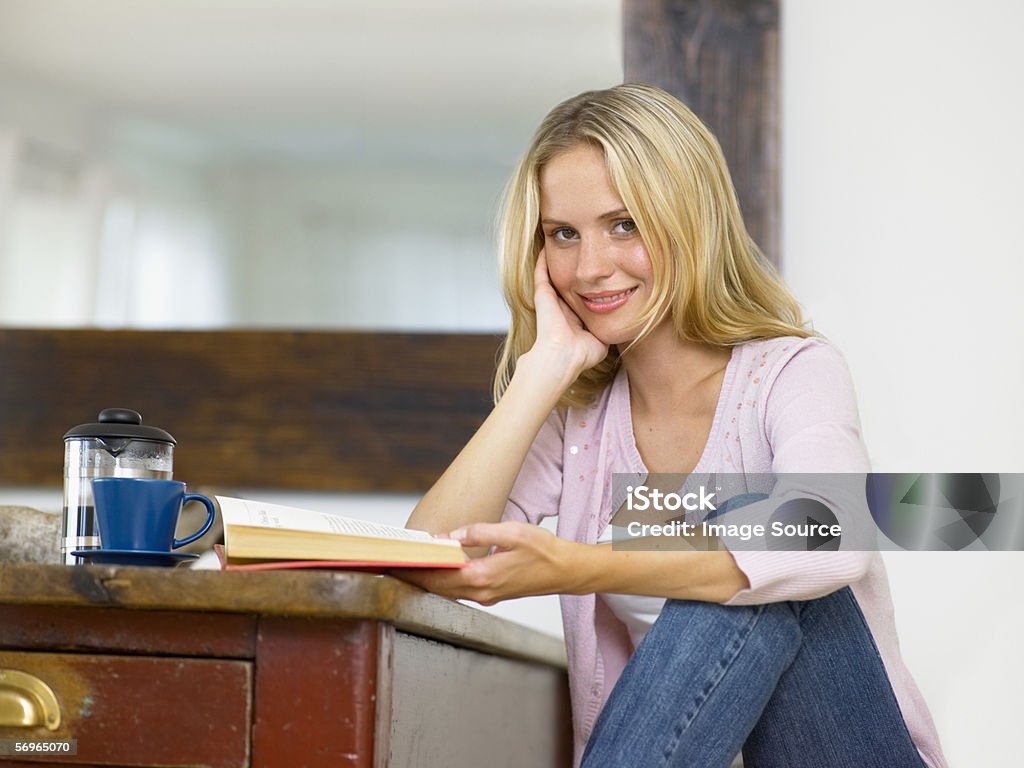 Woman relaxing with a book  Adult Stock Photo