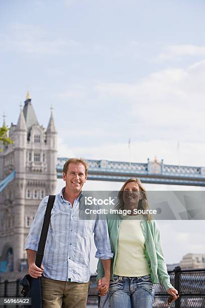 Couple By Tower Bridge Stock Photo - Download Image Now - 30-39 Years, Adult, Adults Only