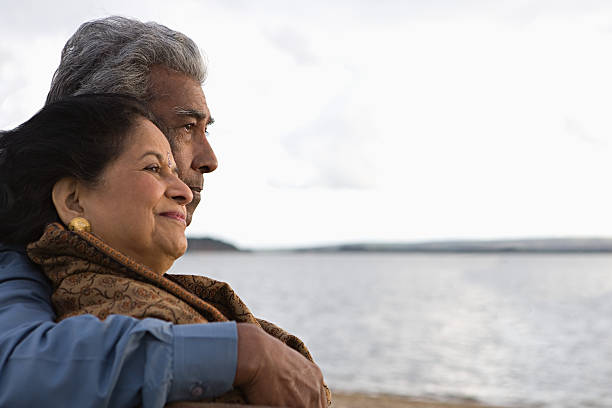 Mature couple by the sea  indian ethnicity lifestyle stock pictures, royalty-free photos & images