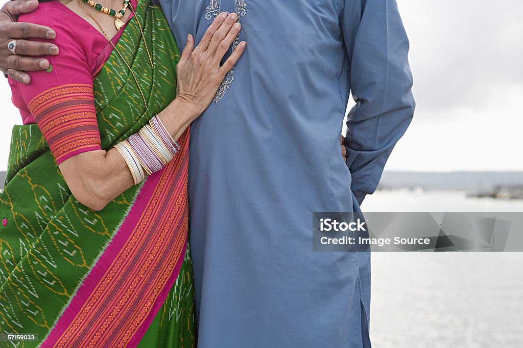 Indian couple by the sea  50-59 Years Stock Photo