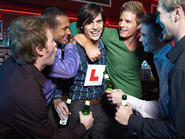 Men drinking in a bar  stag night stock pictures, royalty-free photos & images