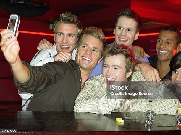 Foto de Men Drinking Shots At A Bar e mais fotos de stock de Bêbado - Bêbado, Selfie, Adulto