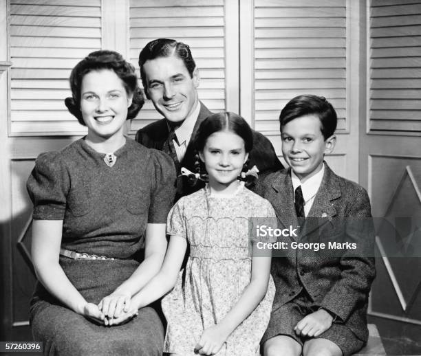 Family Posing At Home Children Portrait Stock Photo - Download Image Now