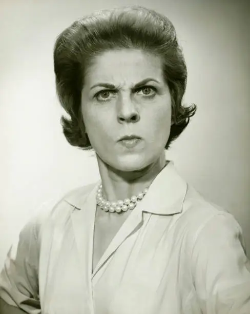 Photo of Angry woman in studio, (B&W), (Portrait)