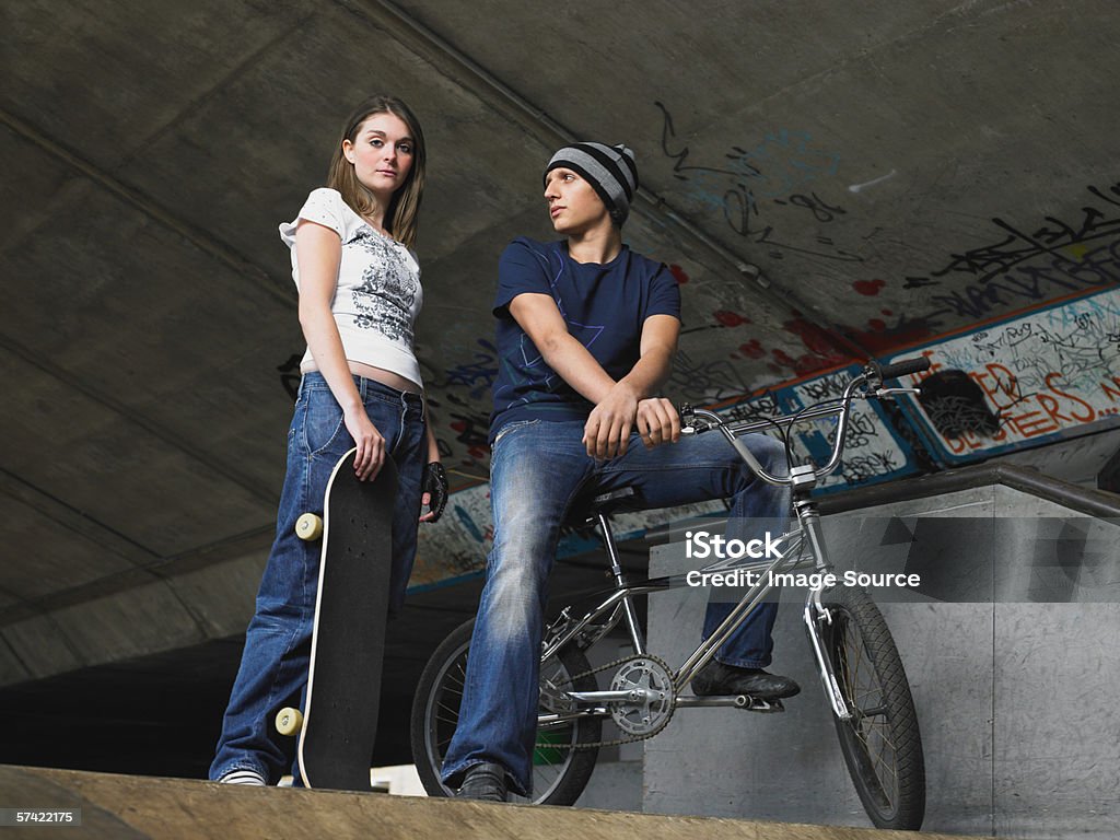 Two teenagers at skate ramp  Skateboard Stock Photo