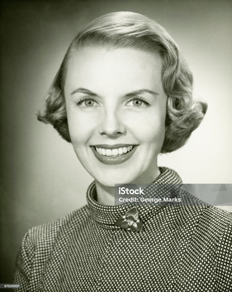 Smiling woman posing in studio, (B&W), portrait, close-up  Women Stock Photo