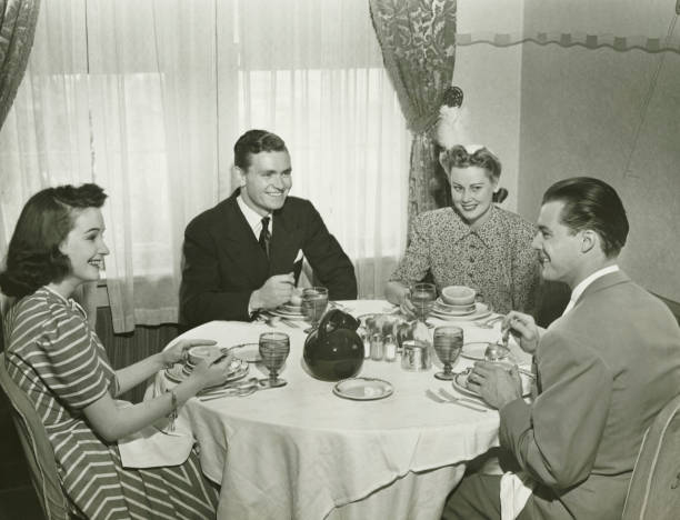 two couples having dinner, (b&w) - middag fotografier bildbanksfoton och bilder