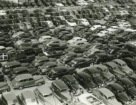 Tamworth, UK - August 30, 2022.  An aerial view of rows of newly built cars and vehicles ready for export and import and delivery to sales dealerships on a shipping dock