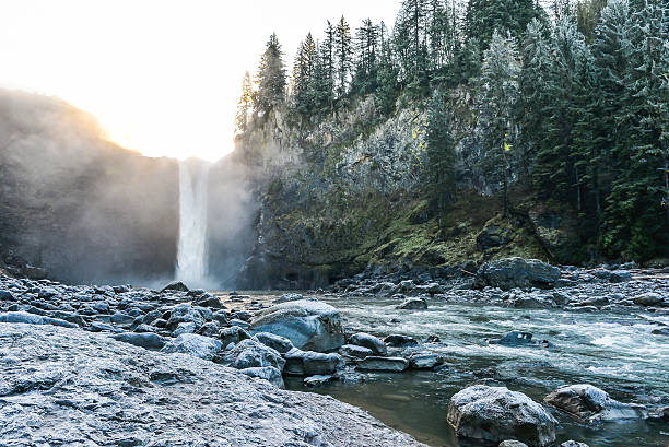 istock Snoqualmie falls with golden fog when sunrise. 576545368