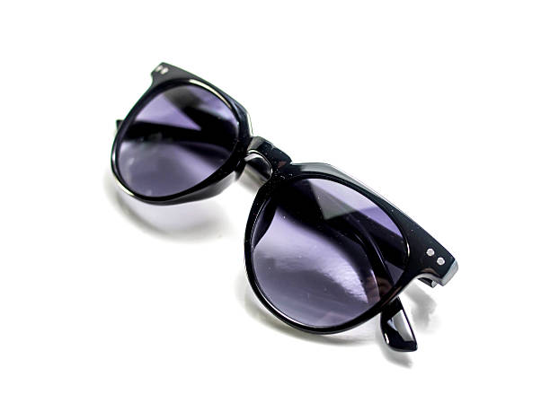 istock Isolated black sunglasses with purple lens 576545952