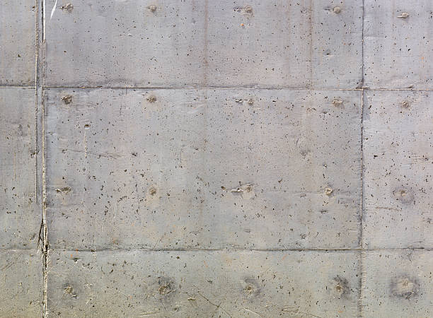 istock texture of gray concrete wall with small depressions 576548372