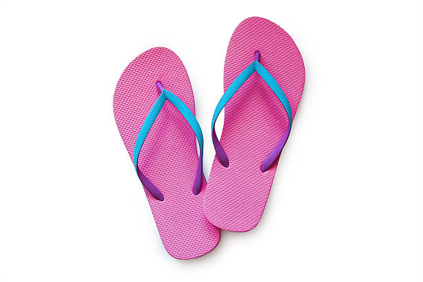 istock Pink flip flops isolated on white background 576549052
