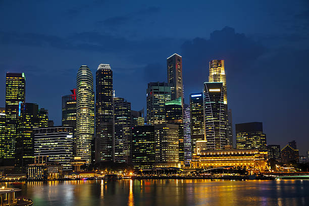 istock Singapore financial district at the night 576554326