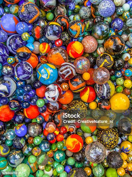 Background Of Marbles Color Diversity Stock Photo - Download Image Now - Multiracial Group, Abstract, Marbles