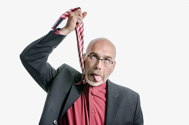 istock Business man hanging with his tie 576570338