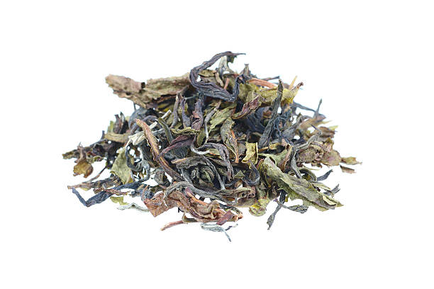 istock pile of tea leaves isolated on white 576572008