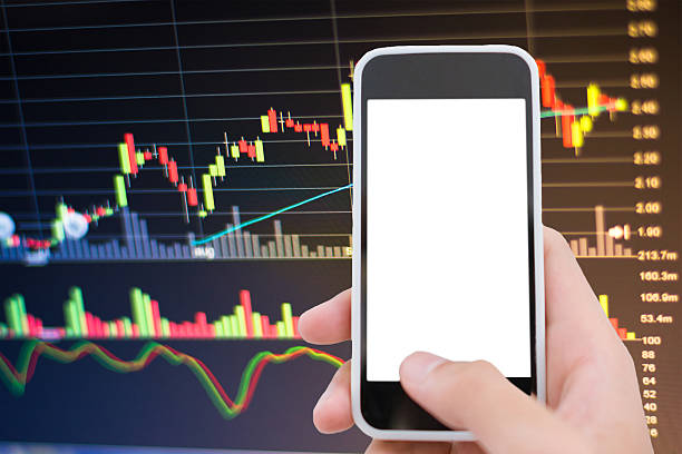 istock Asian Businessman using a smart phone analysis stock 576572744