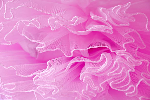 istock Beautiful layers of delicate pink fabric background. 576572868