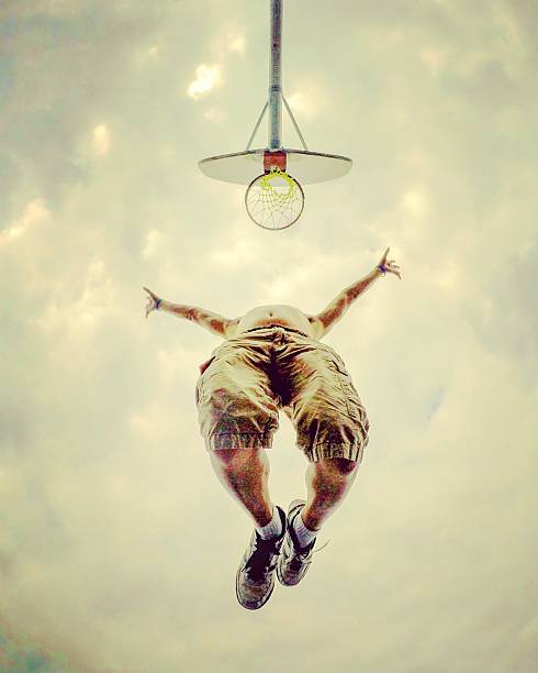 istock Basketball hoop jump 576578944
