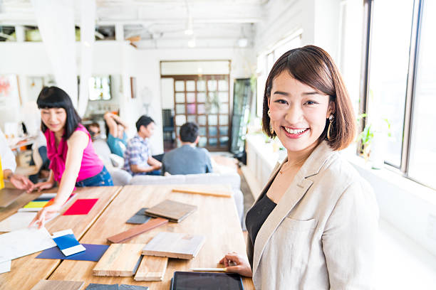 istock Female executive at an interior design or architectural firm 576580460