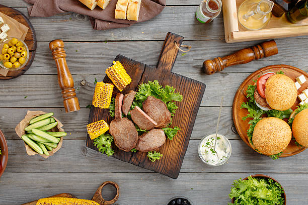 istock Steak grilled with different food 576584170