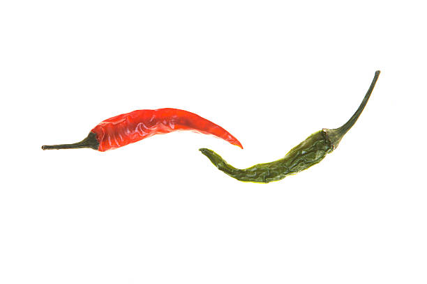 istock green and red chili pepper isolated on a white background 576585454