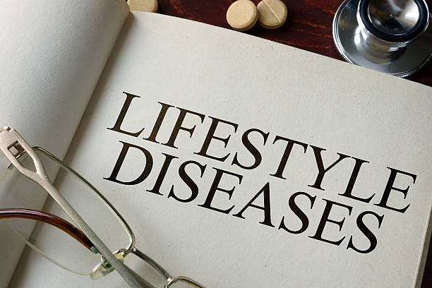 istock Book with diagnosis Lifestyle diseases and pills. 576589184