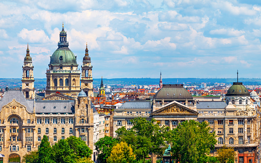 Urban landscape panorama with old buildings and domes of opera in budapest hungary