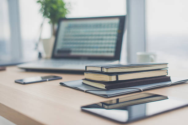 istock Office workplace with laptop and on wood table. 576591922