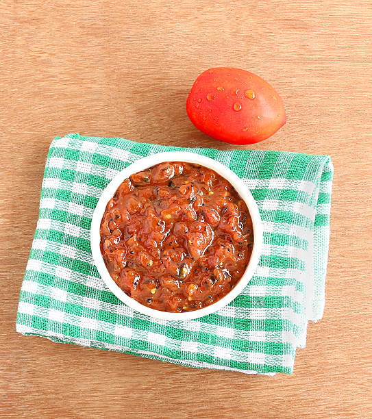 Indian Food Tomato chutney Indian food tomato chutney, a vegetarian, healthy, traditional and popular side dish for items like idli, dosa and chapati. chutney stock pictures, royalty-free photos & images