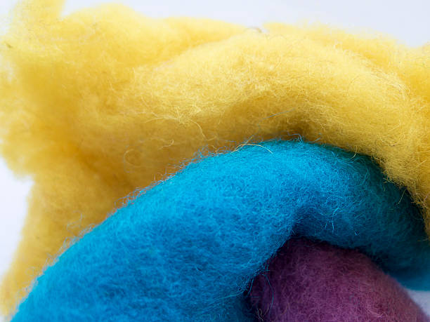 istock Blue, yellow and purple virgin wool for hobby and craft 576594268