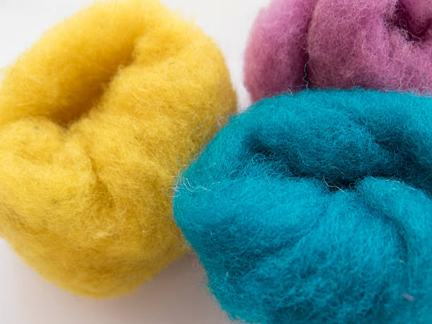 istock Skeins of colored wool on a white background 576594738