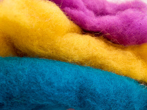 istock Unusual background about handmade with colorful wool stacked lay 576594796