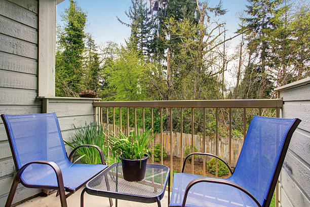 istock Small patio  with furnished back yard at the background 576596350