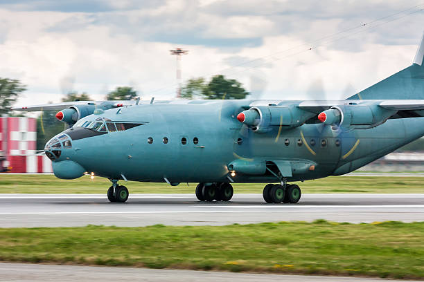 istock Four engine turboprop cargo aircraft heading on the runway 576596362