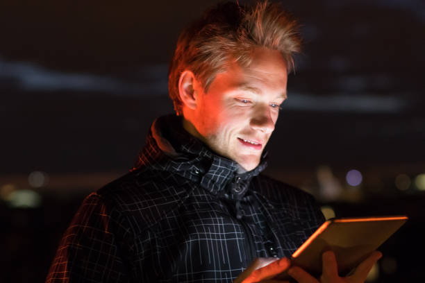 istock In a dark cold night, rooftop reading is fun! 576600158