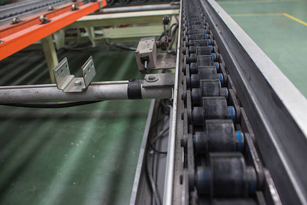 istock The chain and shaft drive Line Conveyor 576602550