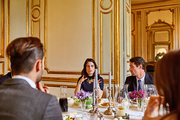 istock Enjoying fine dining with friends 576603652