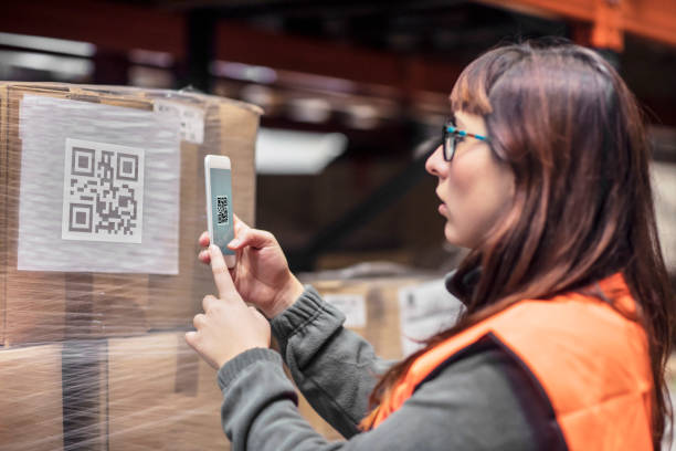 istock Woman reading the barcode with the mobile phone app 576604168