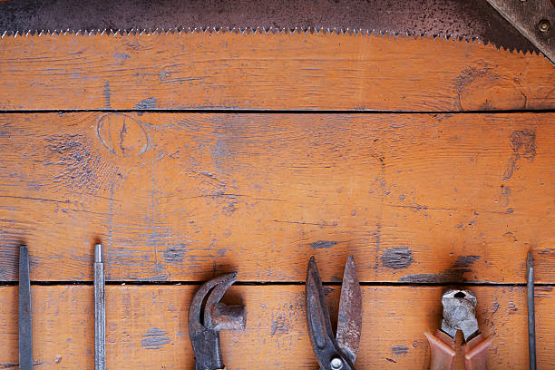 istock tool renovation on grunge wood 576605224