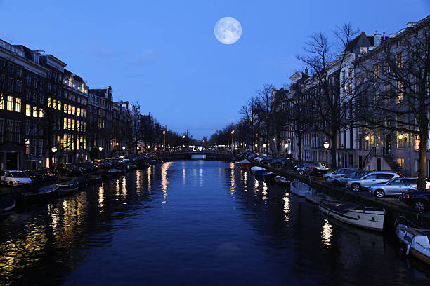 istock Amsterdam canal bridge scenics night view, Netherlands 576605598