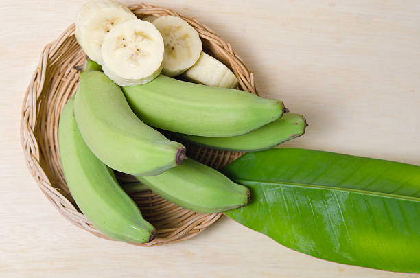 istock Banana fruit sliced on plate with leaf 576710362