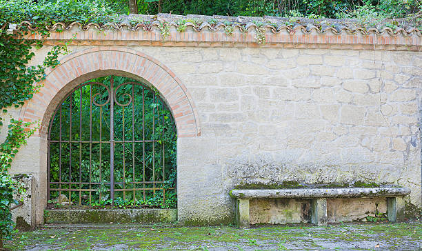 istock Old iron gate, the entrance to the park. 576710564