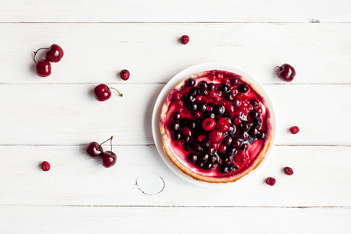 summer yogurt dessert with berries, top view, flat lay