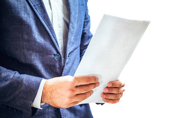 istock Lawyer reading legal contract agreement 576711430