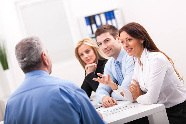 istock Business team cooperating while working on a diagram at office. 576711630