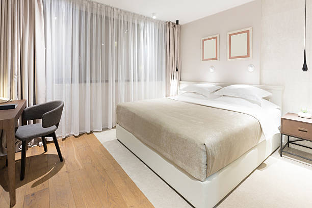 istock Modern bedroom interior in the evening 576712302
