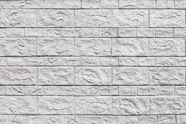 istock Wall of white bricks and large blocks. 576715344
